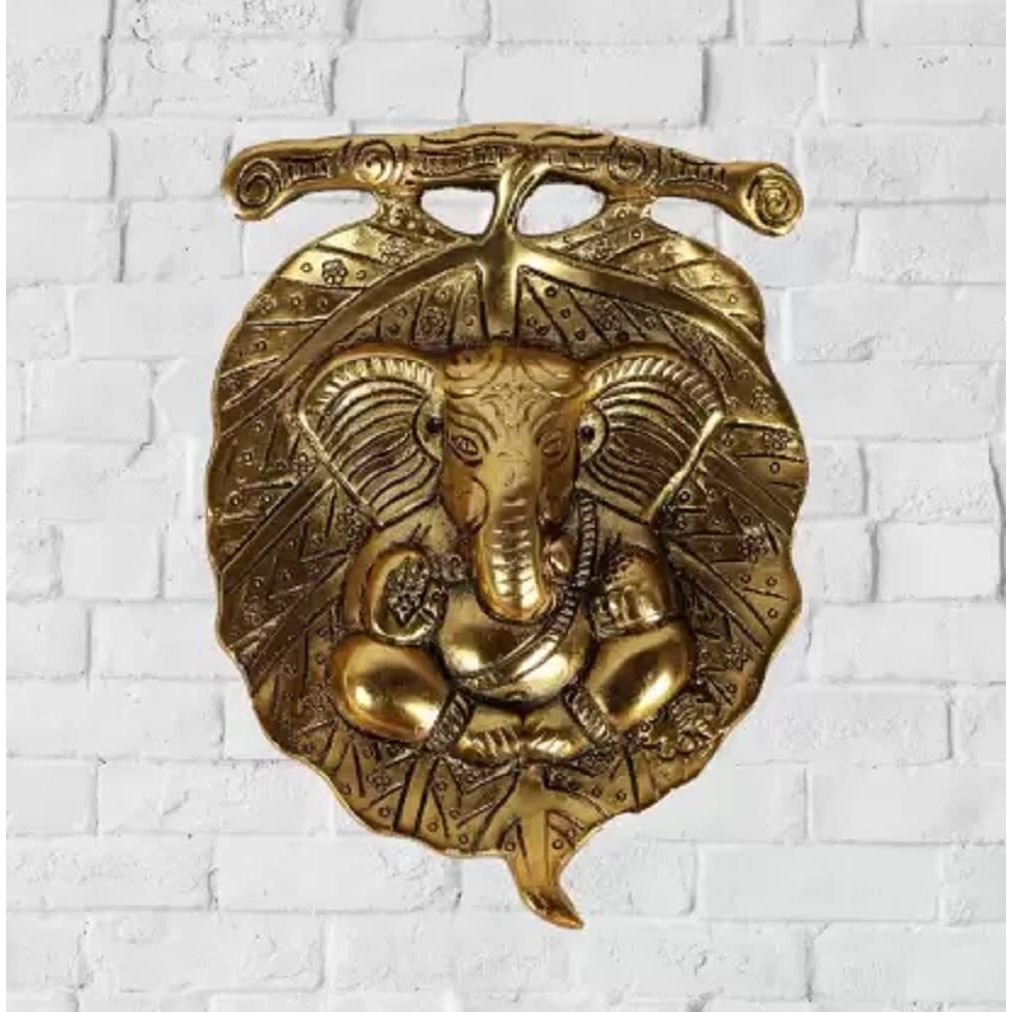 Dreamkraft White Metal Wall Hanging Ganesha Placed On An Antique Finish Peepal Leaf Best Wall Hanging Item For Home Decore, Office And Welcome Door Decor (Golden)