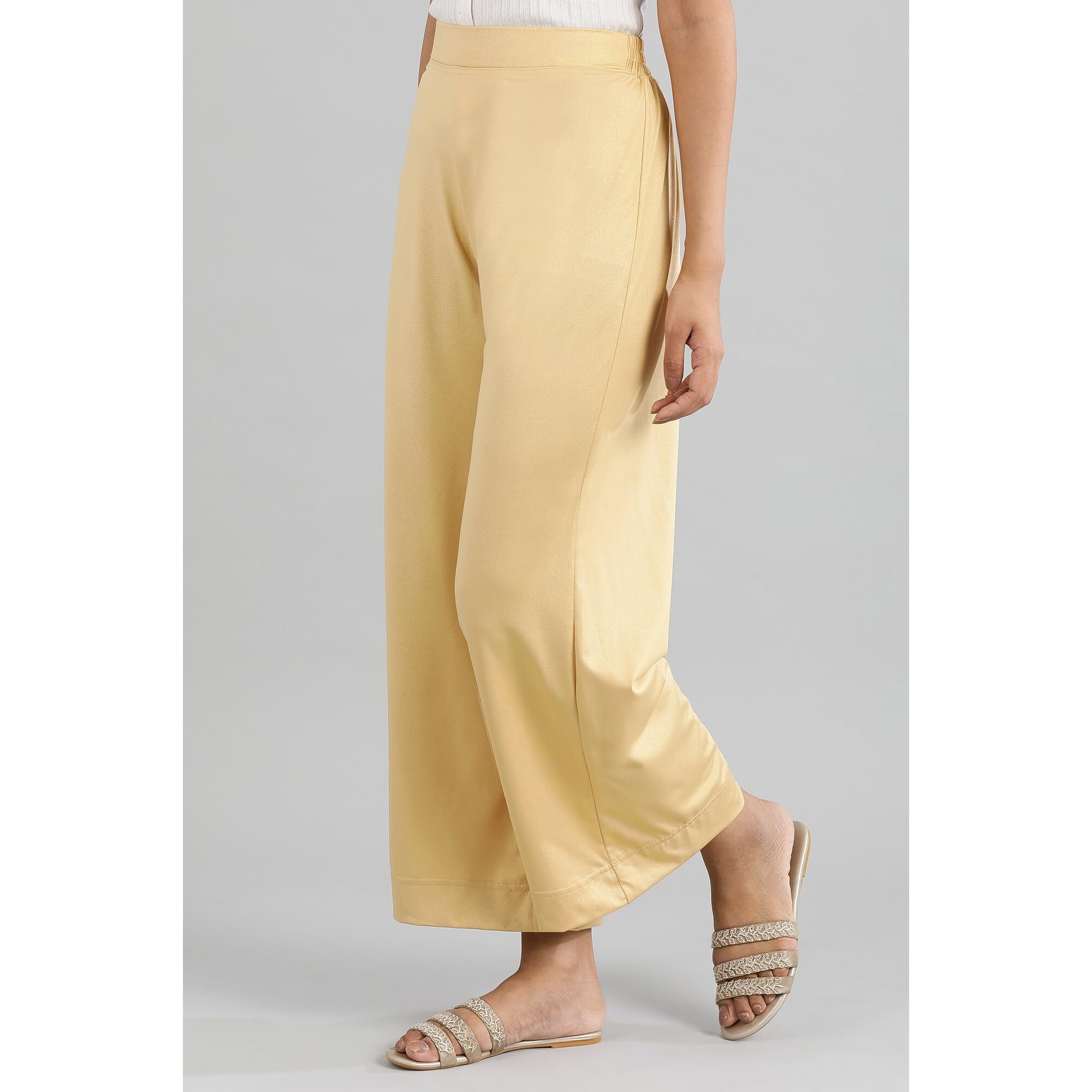 Aurelia Gold Solid Poly Blend Palazzo Ethnic Bottomwear