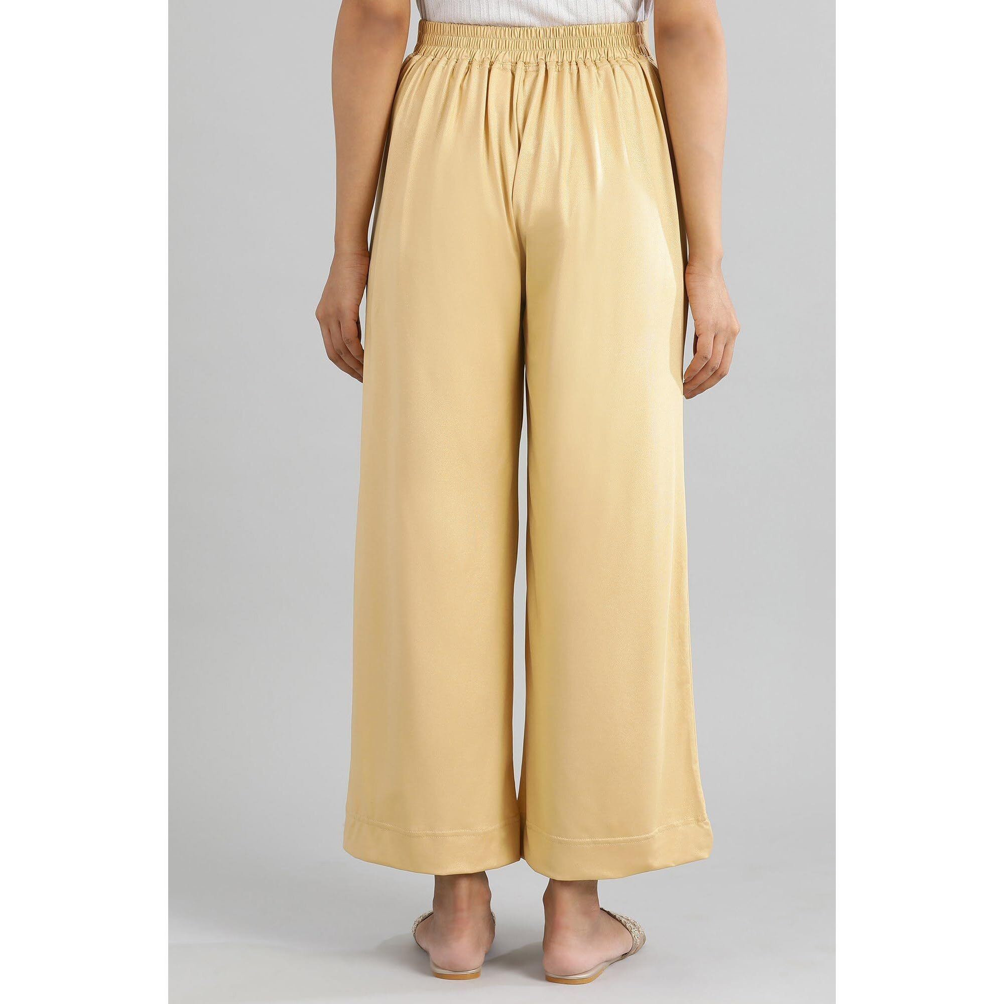 Aurelia Gold Solid Poly Blend Palazzo Ethnic Bottomwear