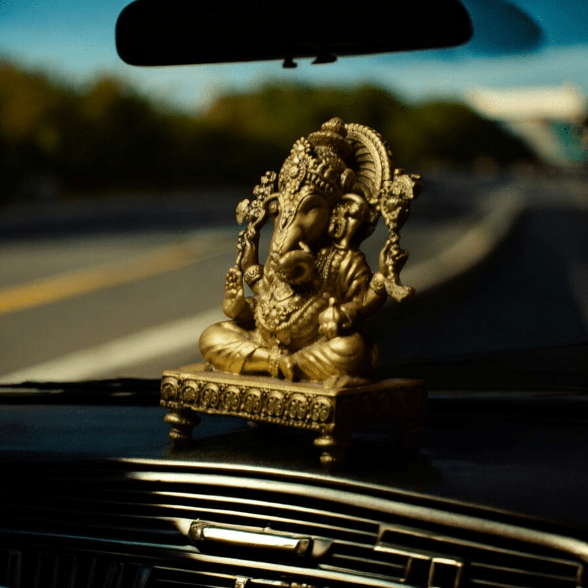 Ganesh ji on chowki- Car dashboard