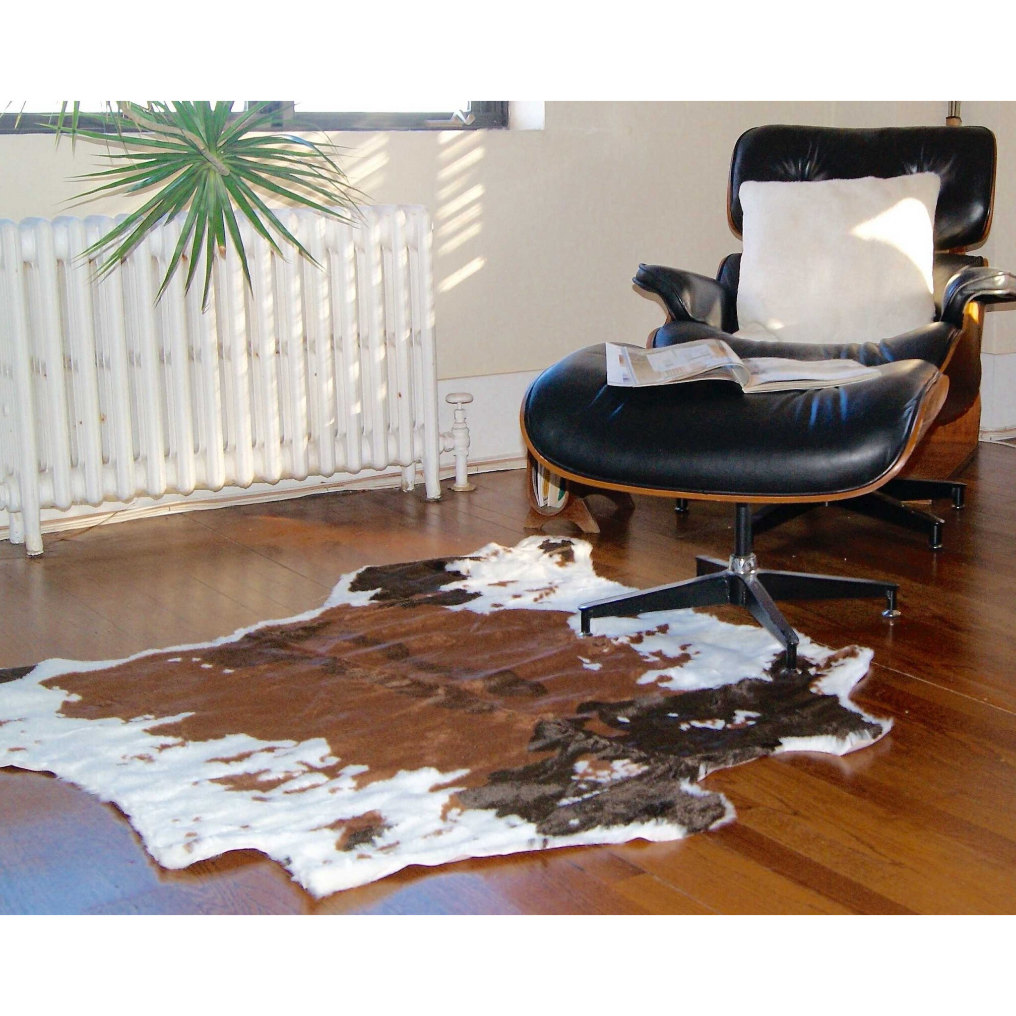 4' X 5' Faux Cow Hide Brown And White Area Rug