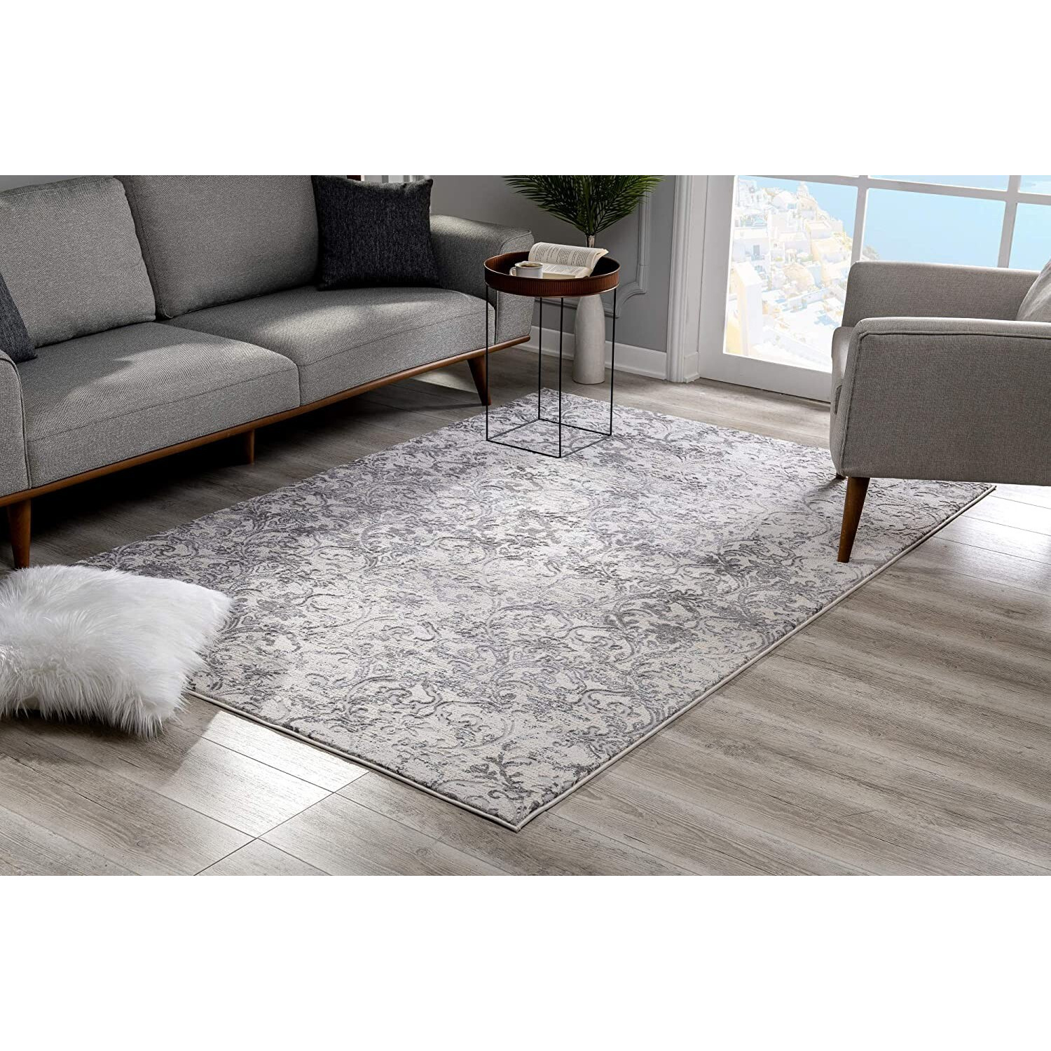 7 X 10 Cream And Gray Faded Filigree Area Rug