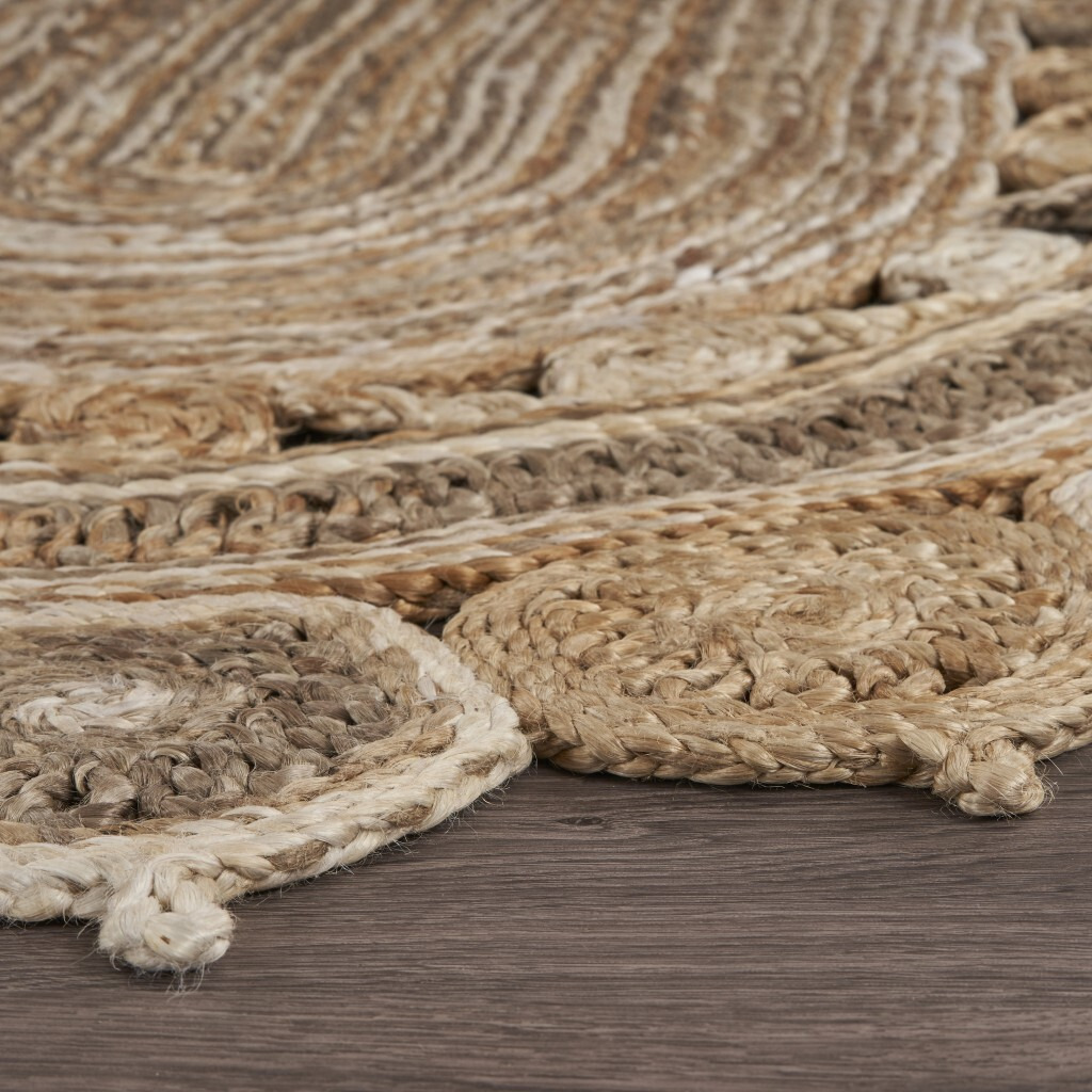 9 Oval Shaped Natural Toned Area Rug