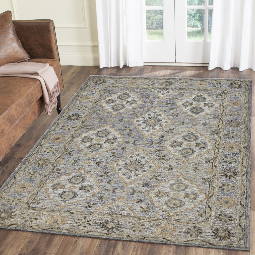 9 X 12 Blue And Tan Traditional Area Rug