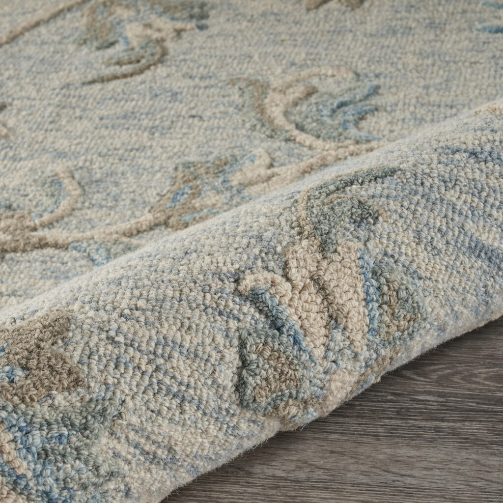 5 Round Blue And Cream Filigree Area Rug