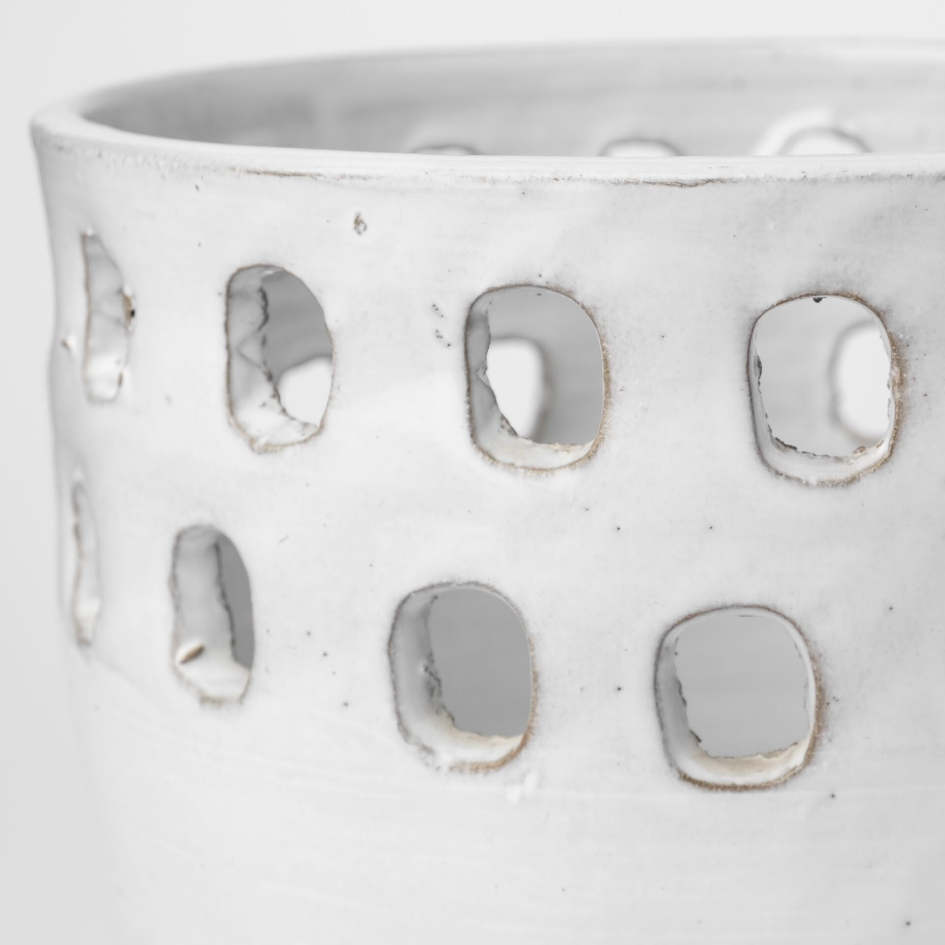 Set Of Two White Ceramic Vases With Hollow Details