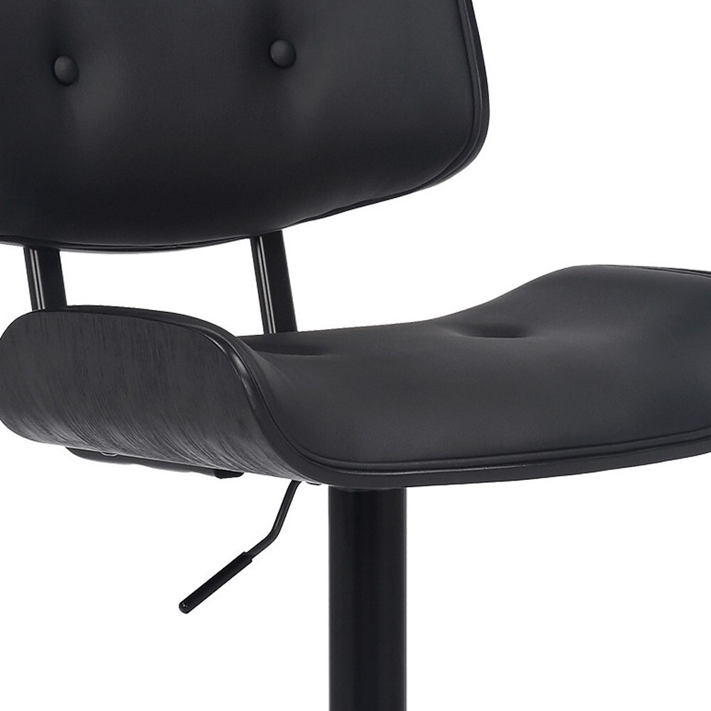 Adjustable Black Tufted Faux Leather And Black Wood Swivel Barstool.