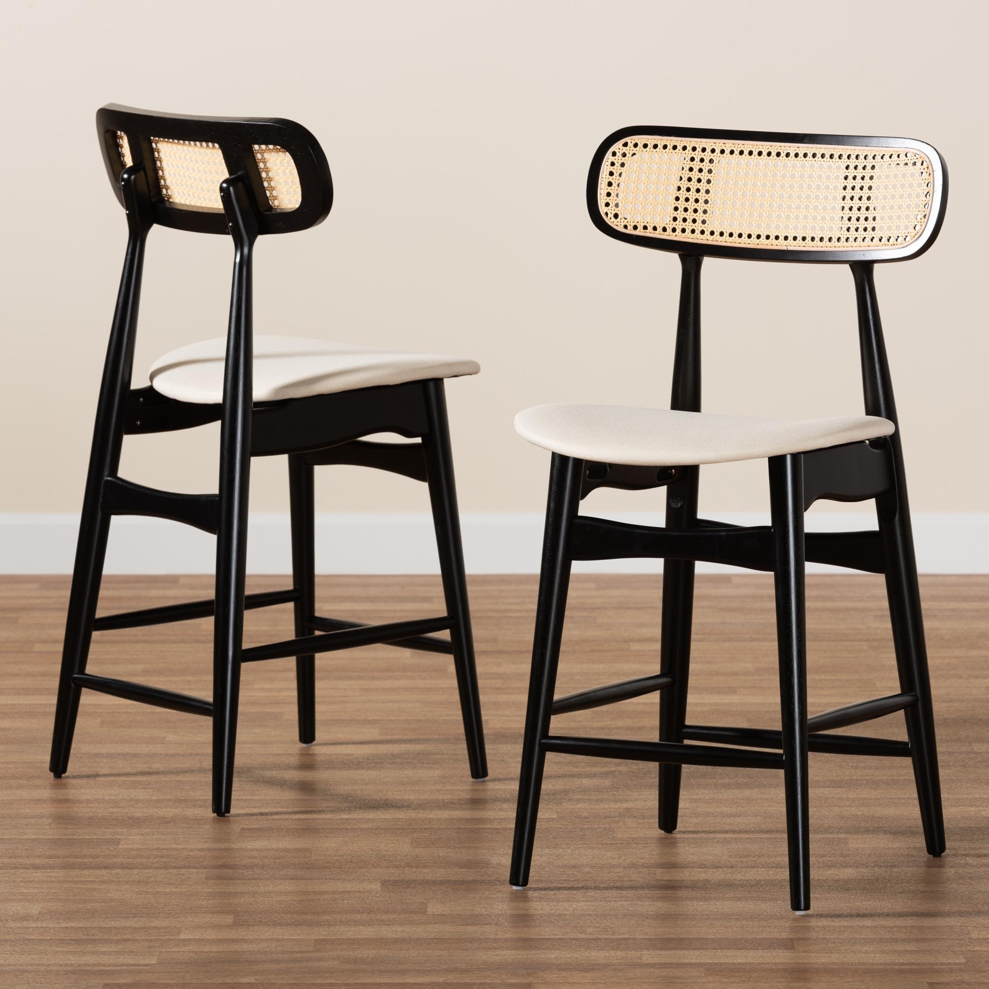 Baxton Studio Tarana Mid-Century Modern Cream Fabric And Black Finished Wood 2-Piece Counter Stool Set