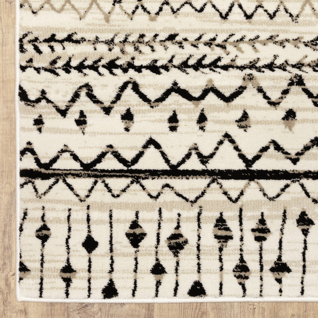 4 X 6 Ivory And Black Eclectic Patterns Indoor Area Rug