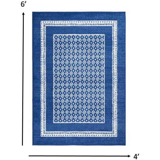 4 X 6 Navy And Ivory Geometric Area Rug