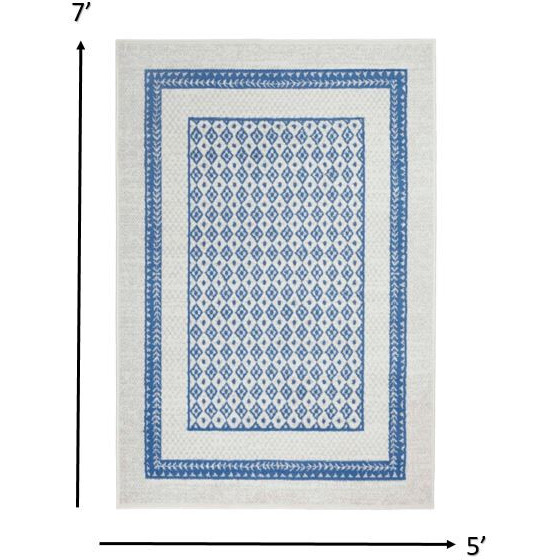 5 X 7 Ivory And Blue Geometric Area Rug