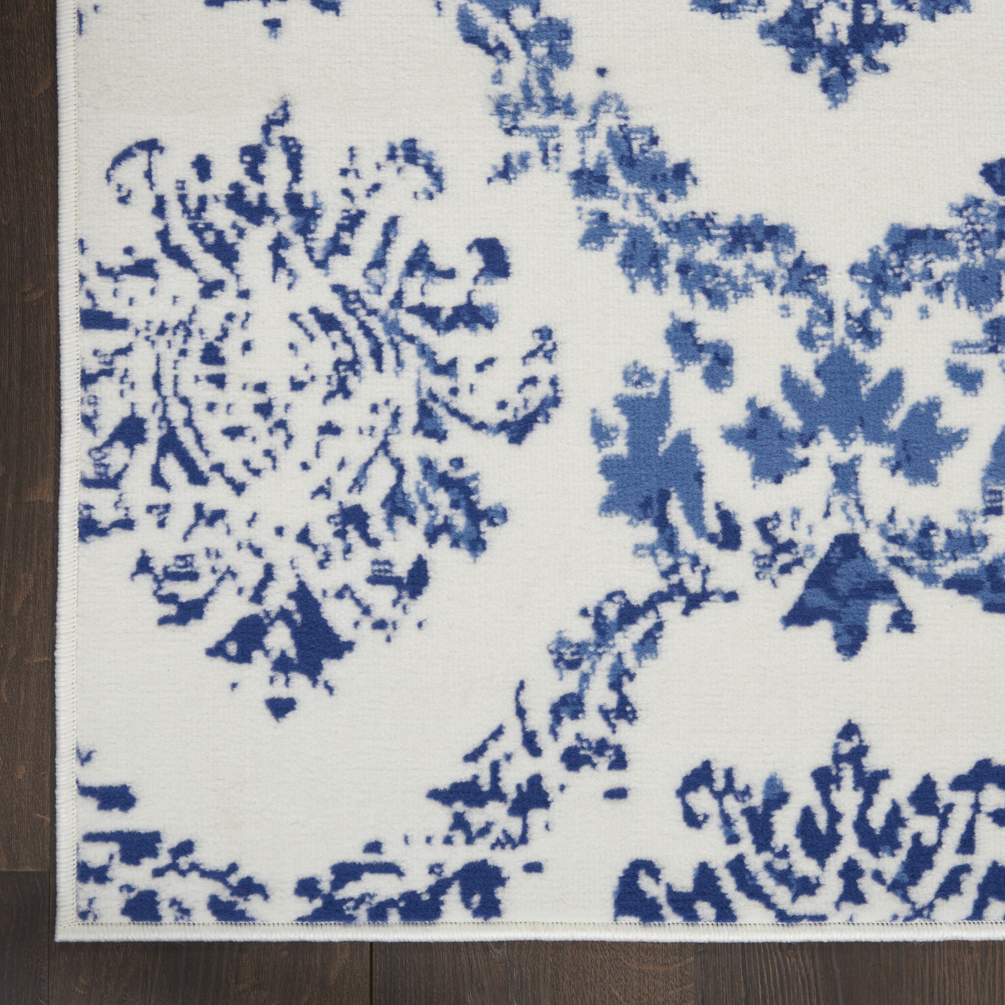6 X 9 Ivory And Navy Damask Area Rug