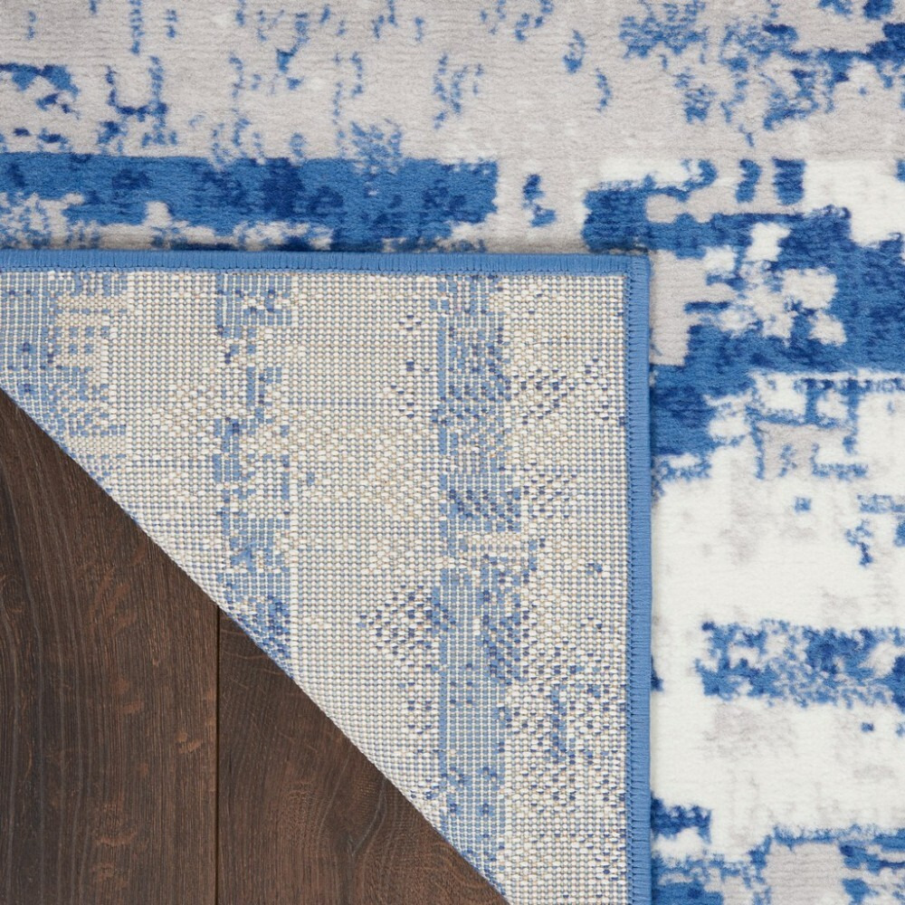 6 X 9 Ivory And Navy Oceanic Area Rug