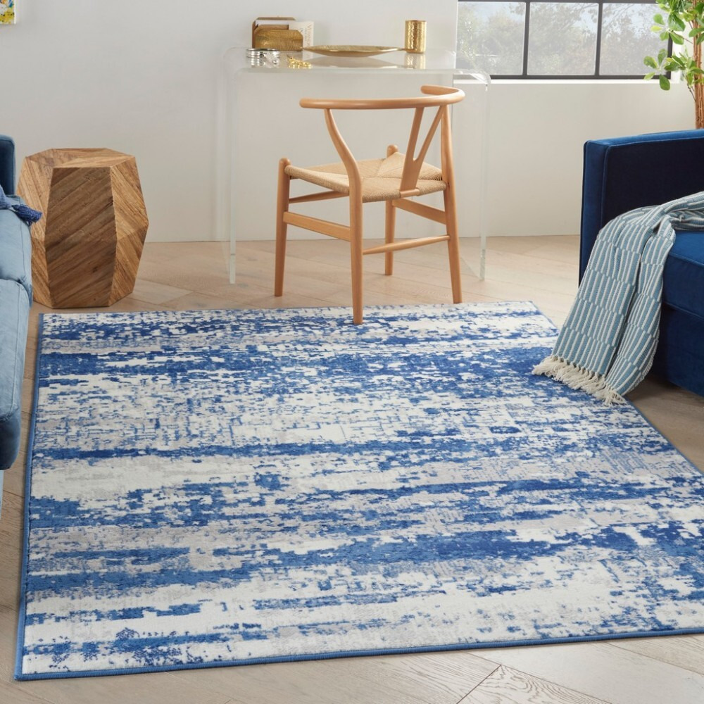 6 X 9 Ivory And Navy Oceanic Area Rug