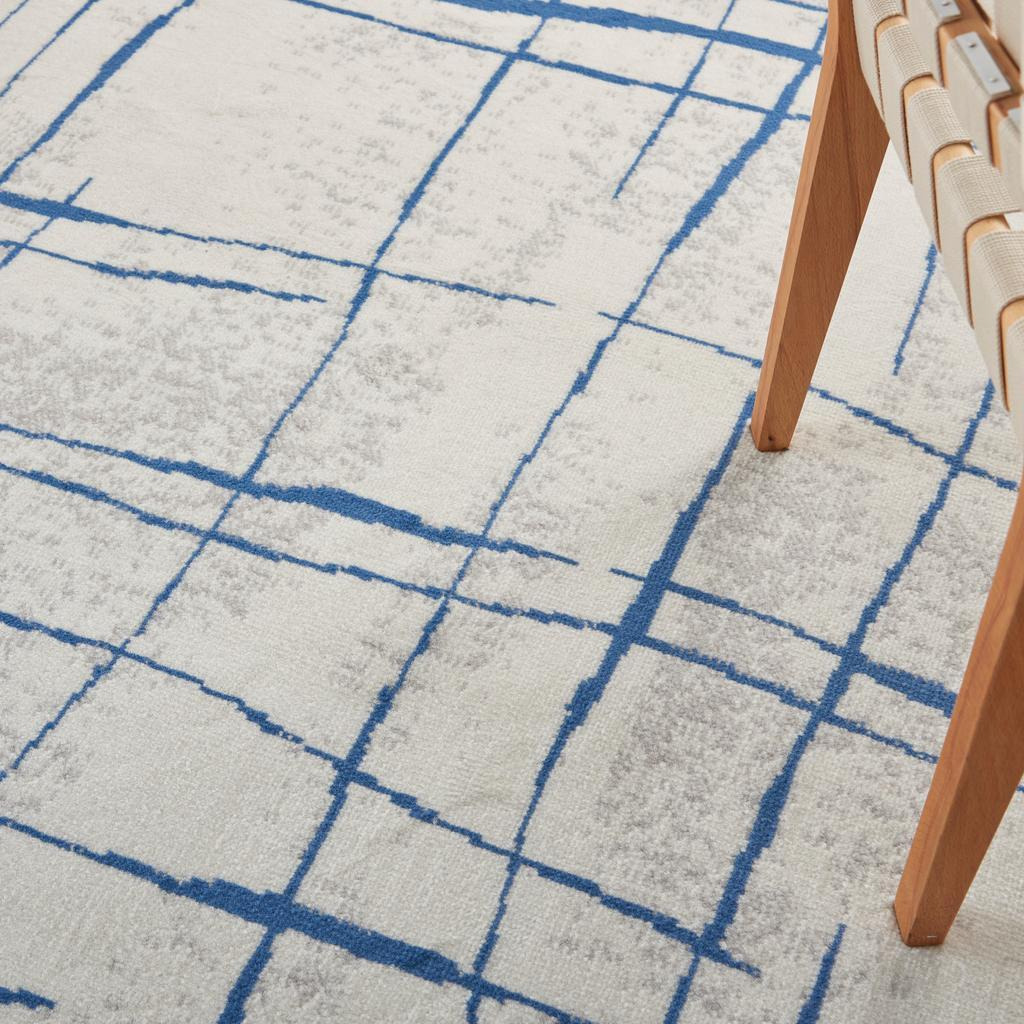 5 X 7 Ivory And Blue Irregular Grids Area Rug