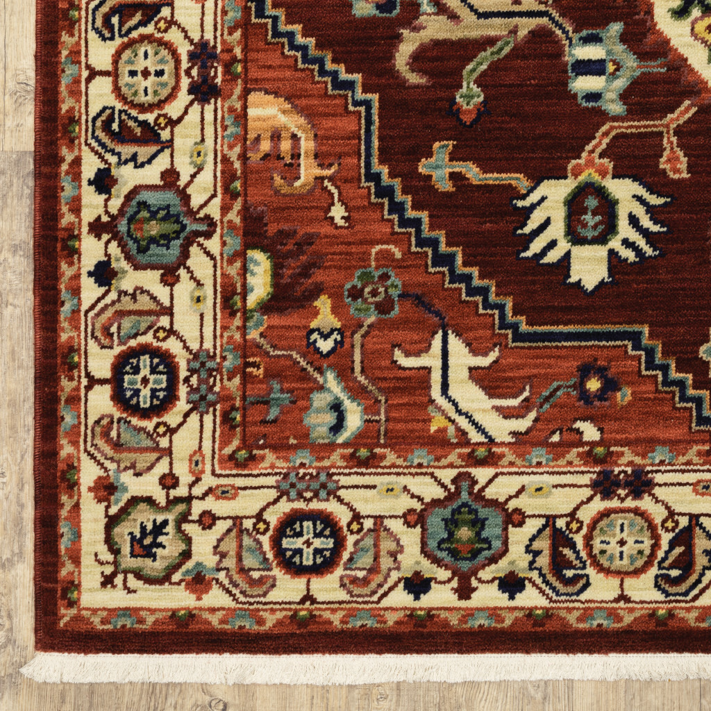 5 X 8 Red Ivory Orange And Blue Oriental Power Loom Stain Resistant Area Rug With Fringe