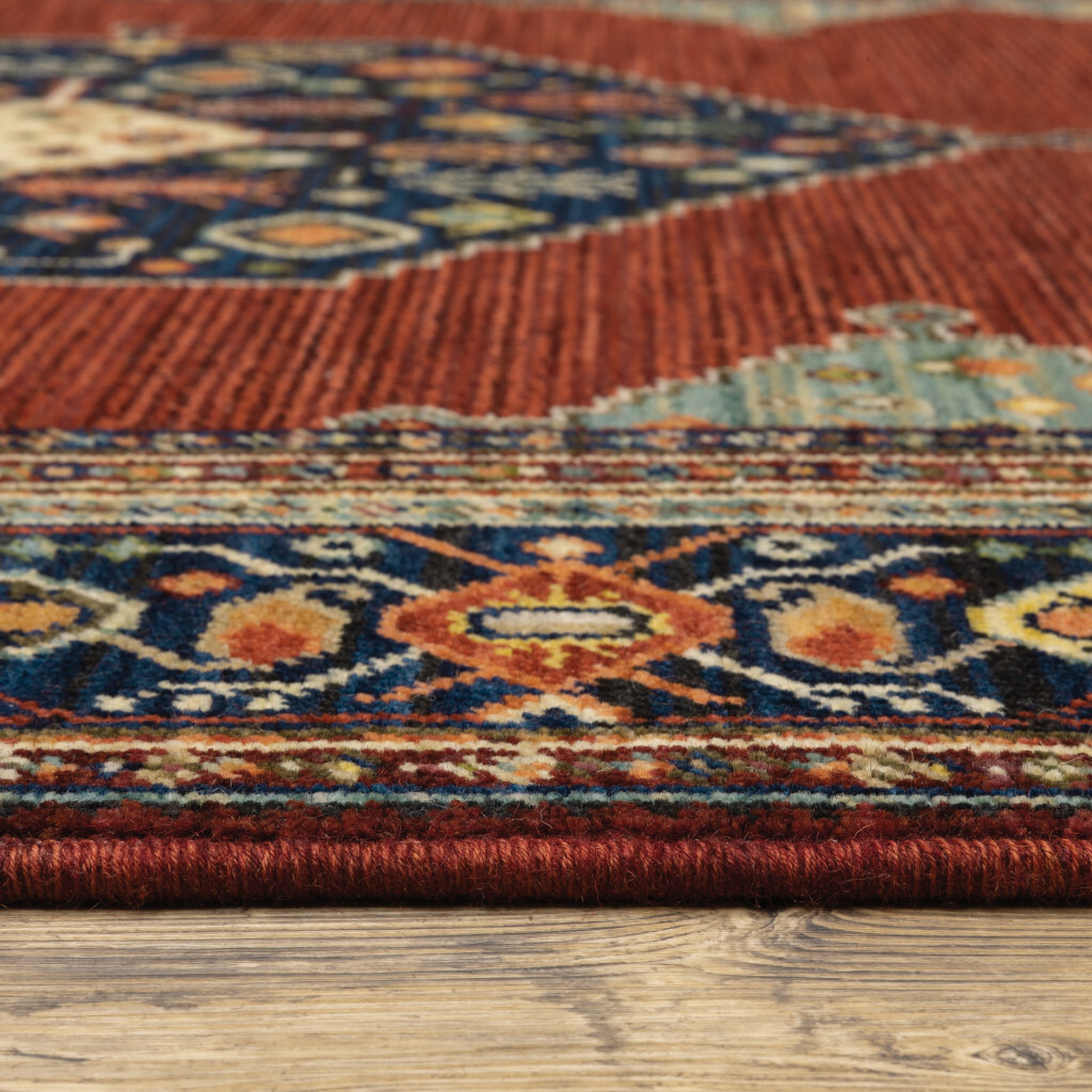 2 X 3 Red Blue Orange And Ivory Oriental Power Loom Stain Resistant Area Rug With Fringe
