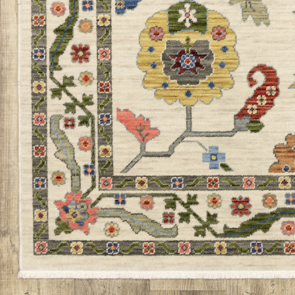 10 X 13 Ivory green Blues Pink Yellow Rust Brown Tan And grey Oriental Power Loom Stain Resistant Area Rug With Fringe
