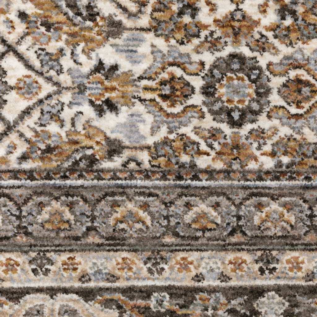 2 X 3 Ivory And grey Oriental Power Loom Stain Resistant Area Rug With Fringe