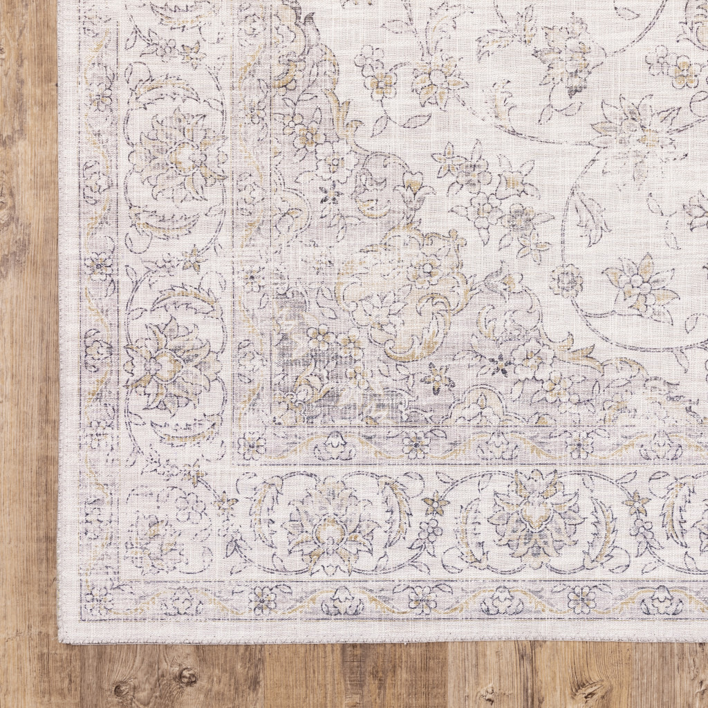 5 X 7 Beige gold And grey Oriental Power Loom Stain Resistant Area Rug