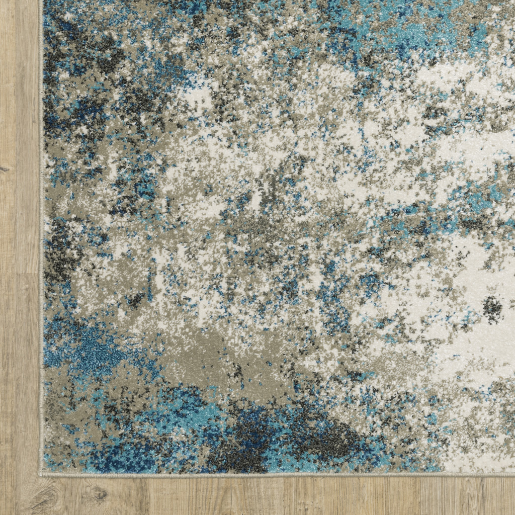 5 X 7 Blue grey And Beige Abstract Power Loom Stain Resistant Area Rug