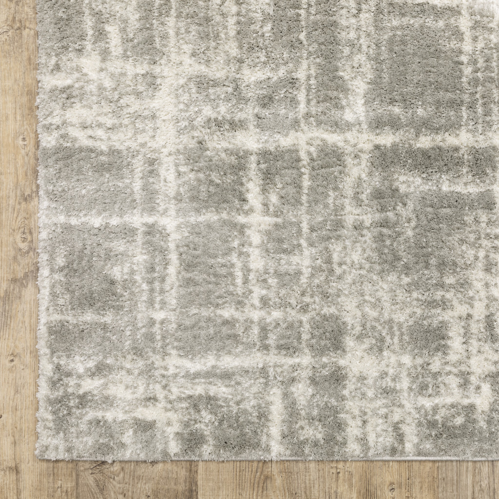 2 X 3 grey And Ivory Abstract Shag Power Loom Stain Resistant Area Rug