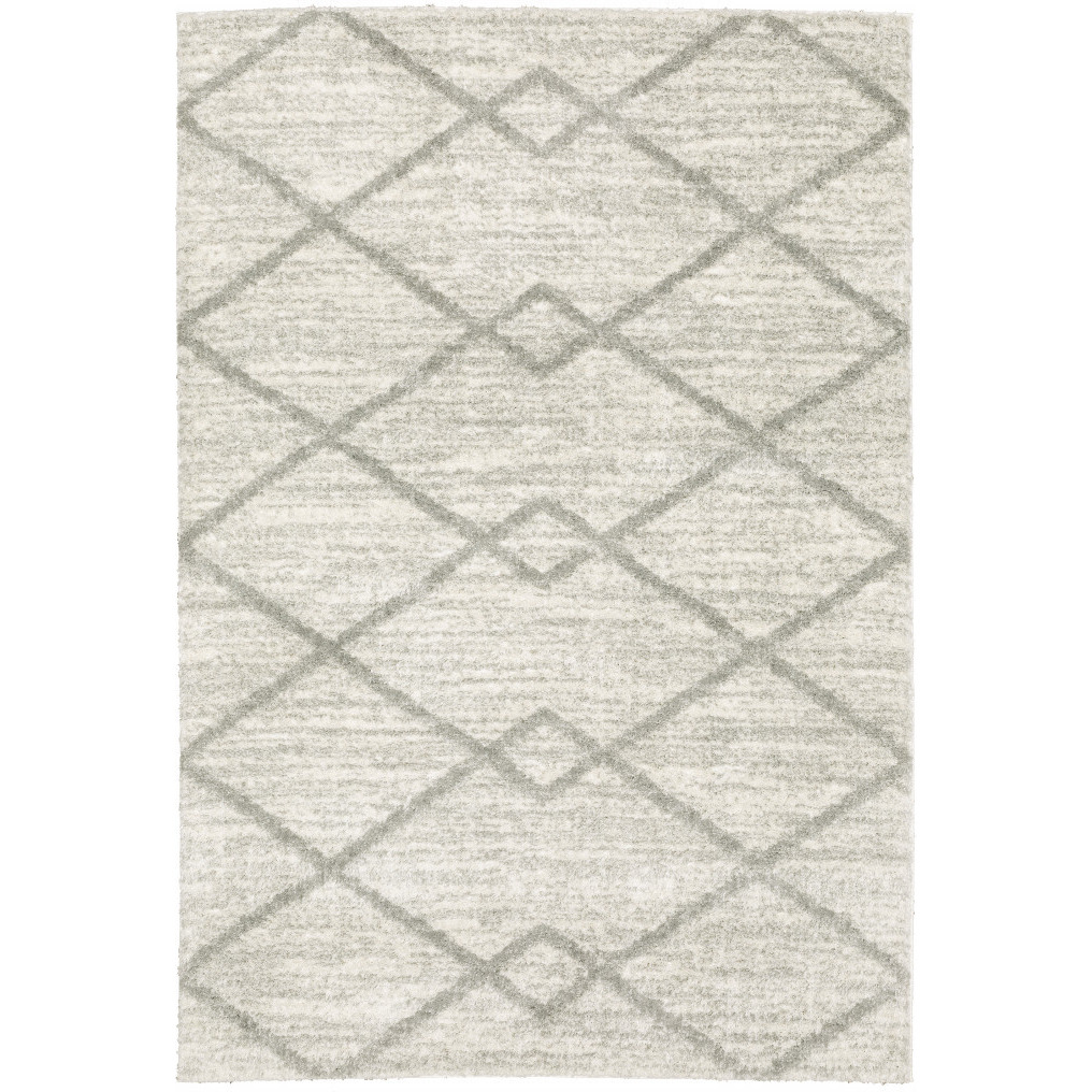 5 X 8 Ivory And grey geometric Shag Power Loom Stain Resistant Area Rug