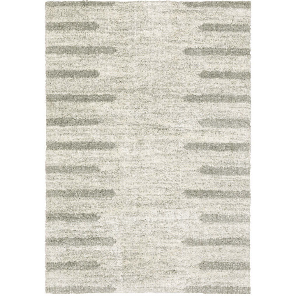 5 X 8 Ivory And grey geometric Shag Power Loom Stain Resistant Area Rug