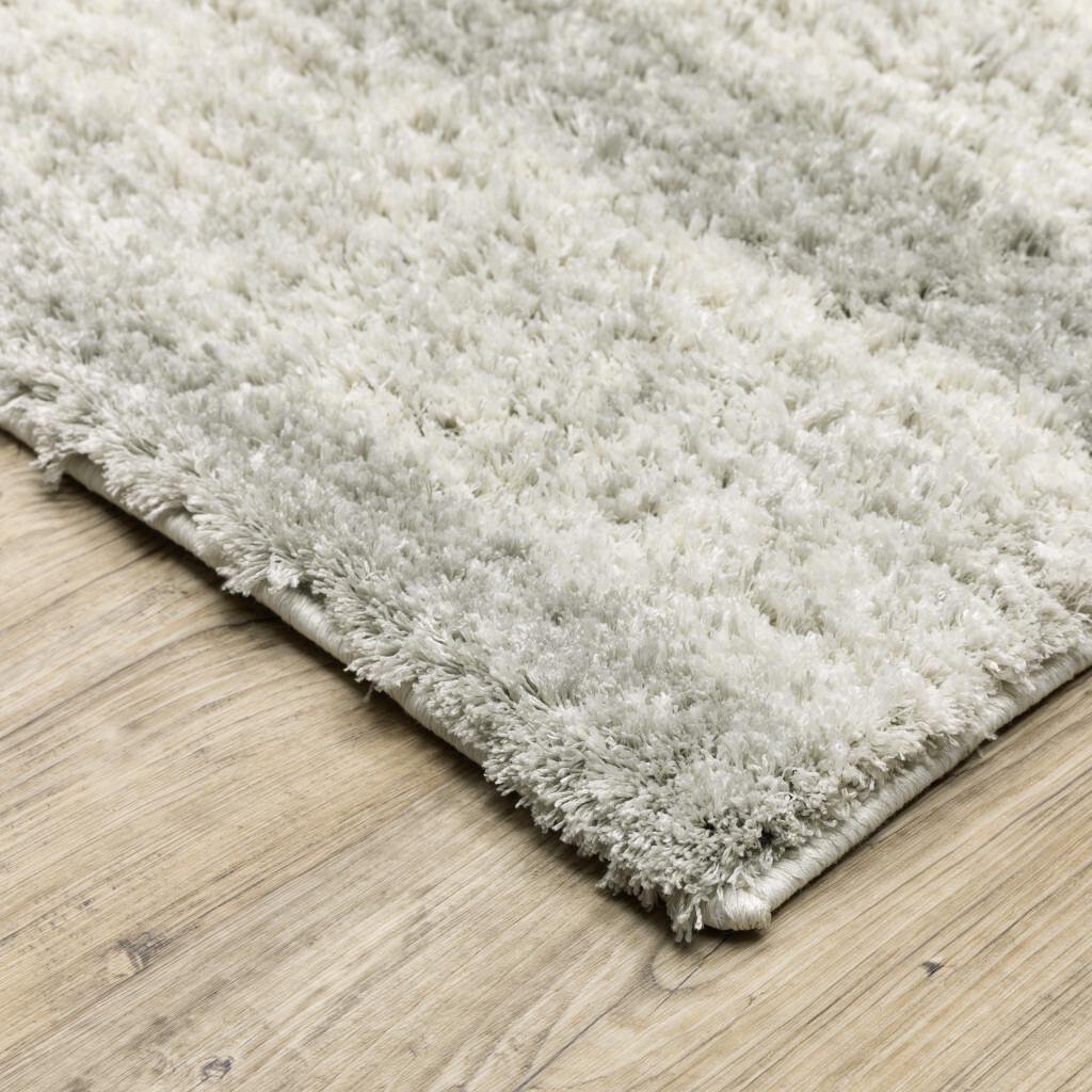 5 X 8 Ivory And grey geometric Shag Power Loom Stain Resistant Area Rug