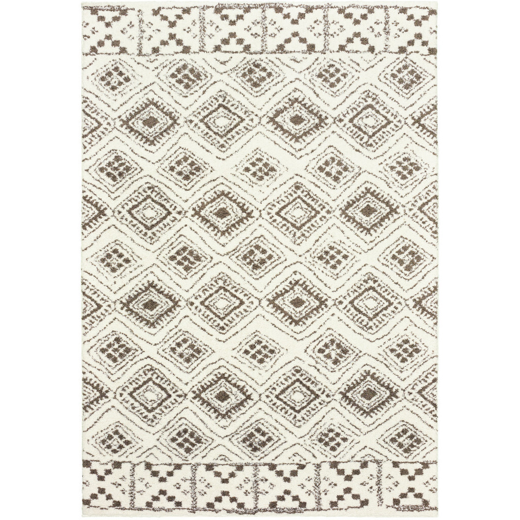 5 X 8 Ivory And Brown geometric Shag Power Loom Stain Resistant Area Rug