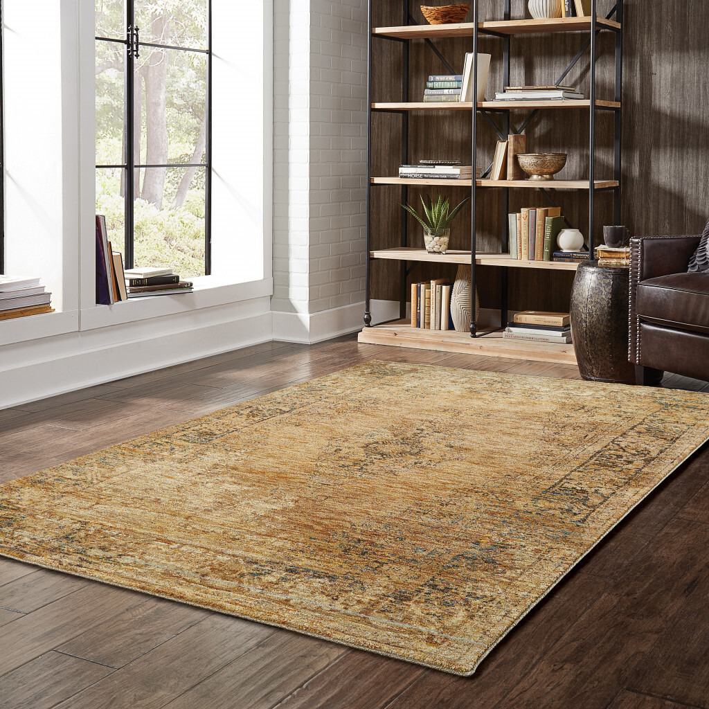 10 X 13 gold And Brown Oriental Power Loom Stain Resistant Area Rug