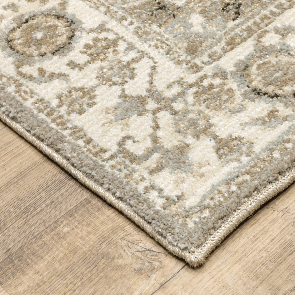 2 X 3 grey Ivory Tan Brown And gold Oriental Power Loom Stain Resistant Area Rug