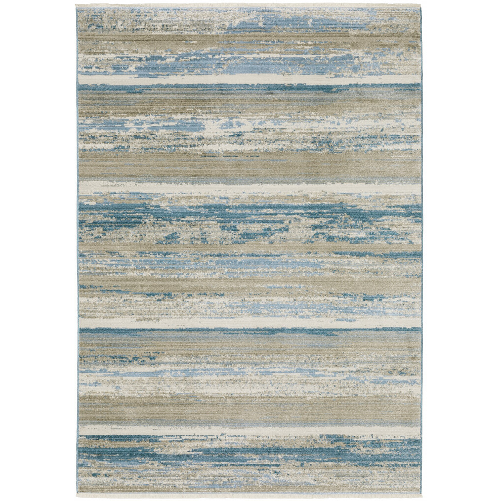 5 X 8 Ivory Beige grey Blue And Tan Abstract Power Loom Stain Resistant Area Rug With Fringe