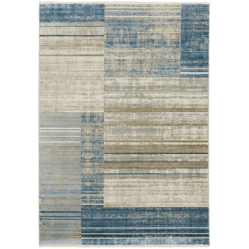 5 X 8 Blue Dark Blue Teal grey Ivory Beige And Tan geometric Power Loom Stain Resistant Area Rug With Fringe