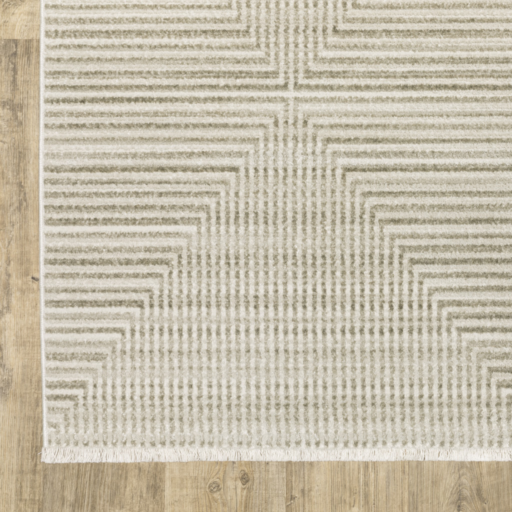 8 Ivory Beige Taupe And Tan geometric Power Loom Runner Rug With Fringe