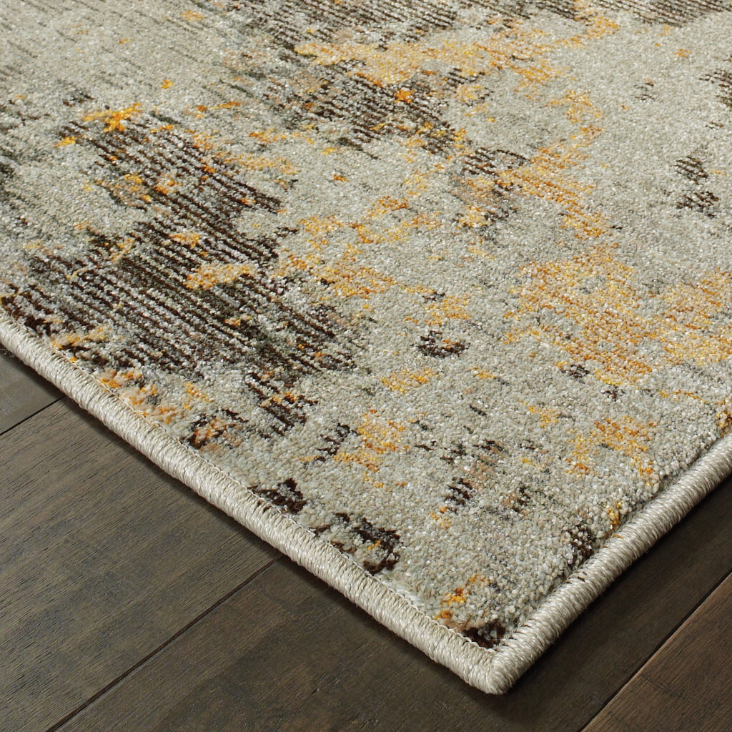 2 X 3 grey And gold Abstract Power Loom Stain Resistant Area Rug