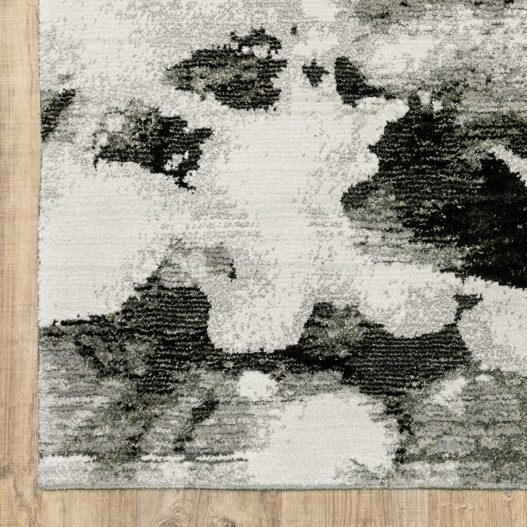 2 X 8 charcoal And White Abstract Power Loom Stain Resistant Runner Rug