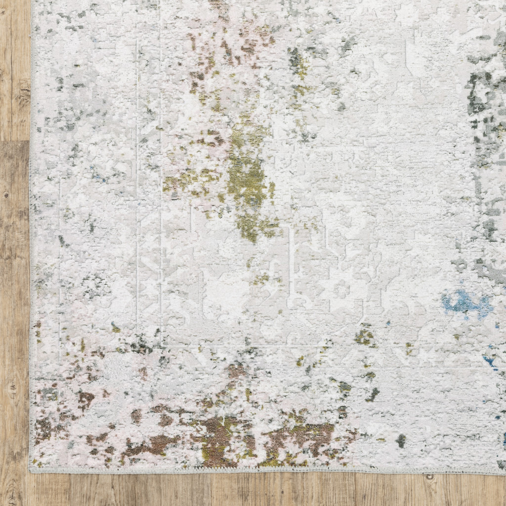 2 X 3 Ivory And Blue Abstract Printed Stain Resistant Non Skid Area Rug