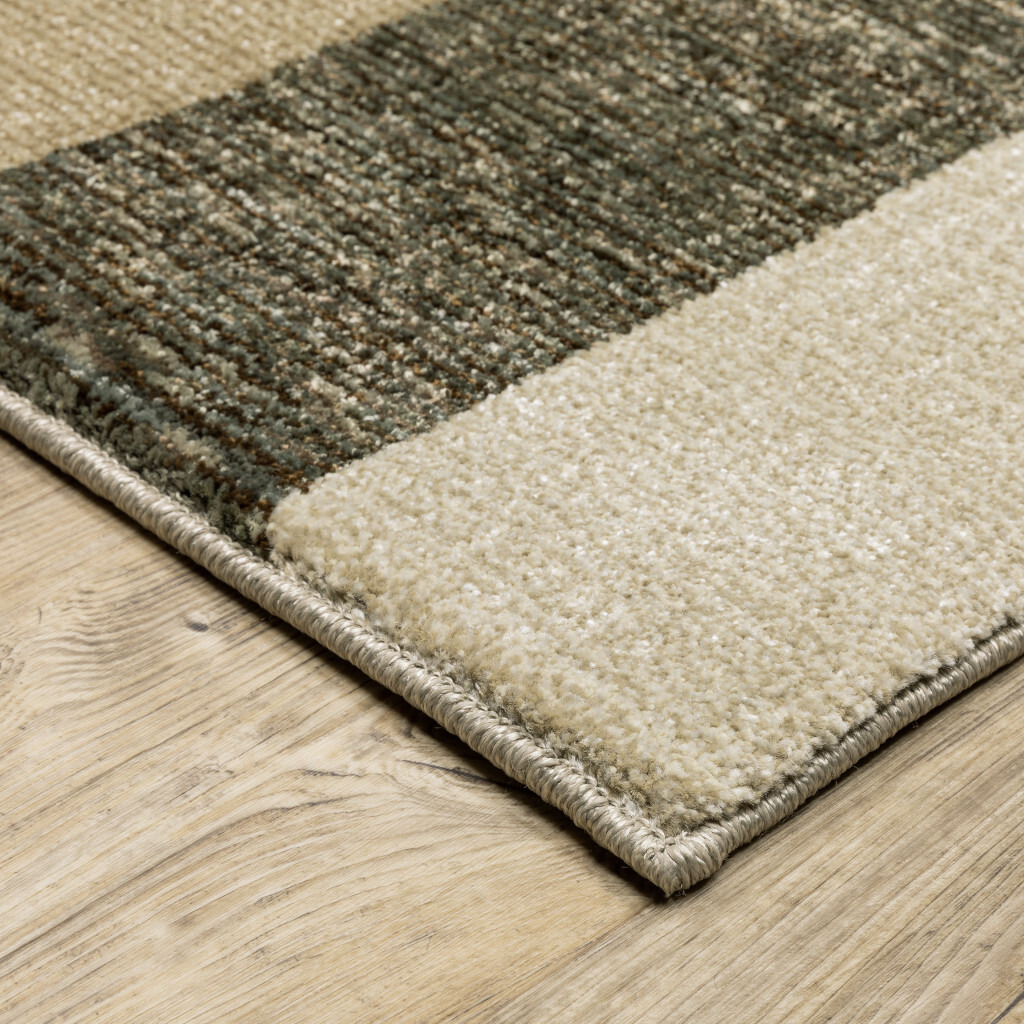 3 X 5 Brown And Ivory geometric Power Loom Area Rug