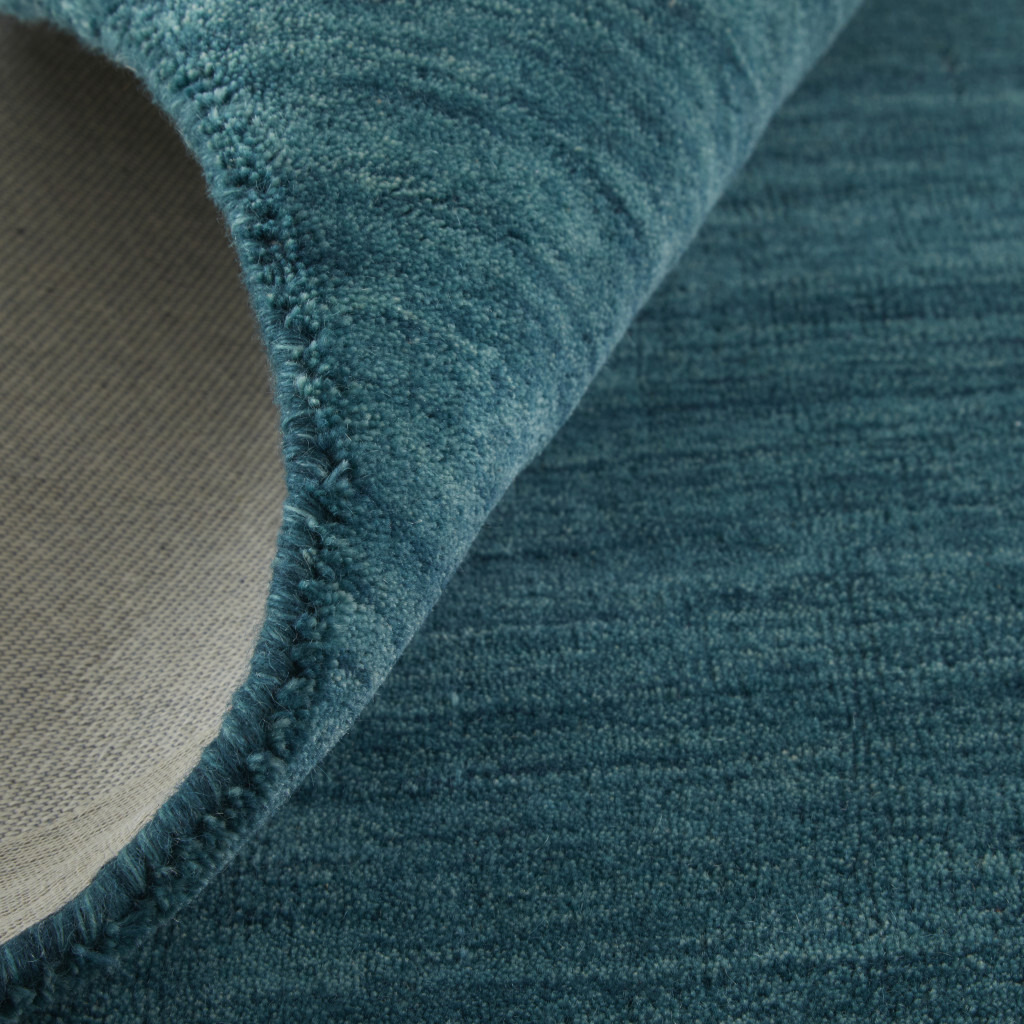 8 Blue And green Round Wool Hand Woven Stain Resistant Area Rug