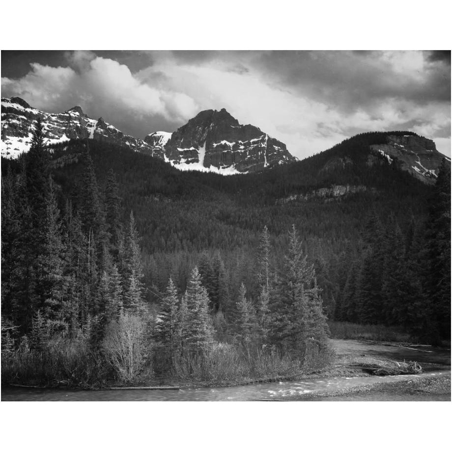 View of streamside trees and snow on mountains - Northeast Portion, Yellowstone National Park, Wyoming, ca. 1941-1942-Paper Art-24&quotx19"