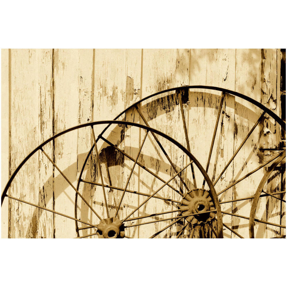 Old wagon wheels against a shed in Buffalo Gap Historic Village, near Abilene, TX - Sepia-Paper Art-50&quotx34"