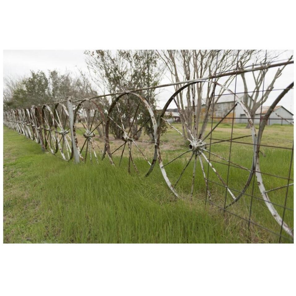 A fence made of wagon wheels near Schulenburg in Fayette County, TX-Paper Art-32&quotx22"