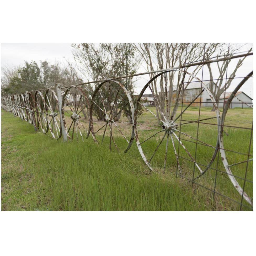 A fence made of wagon wheels near Schulenburg in Fayette County, TX-Paper Art-50&quotx34"