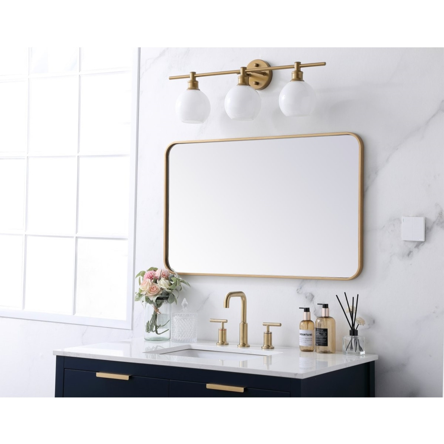 Soft corner metal rectangular mirror 22x36 inch in Brass