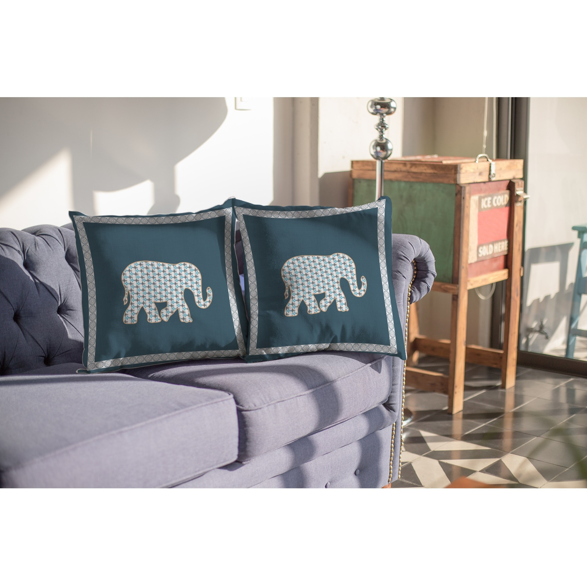 Light Elephant Suede Blown and Closed Pillow White on Muted Blue