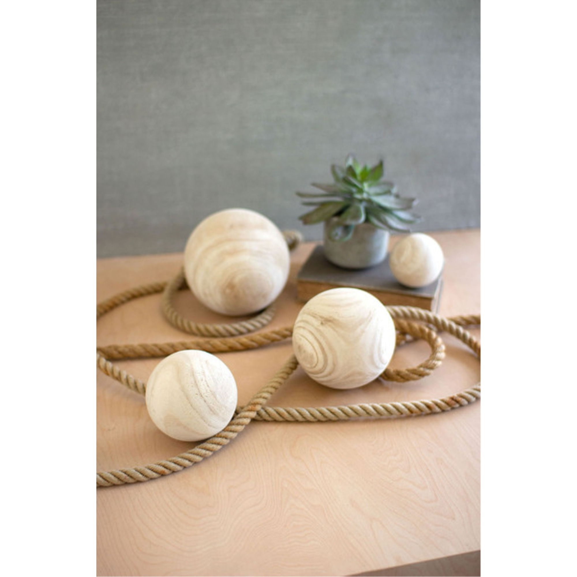 SET OF FOUR NATURAL WOODEN SPHERES - ONE EACH SIZE