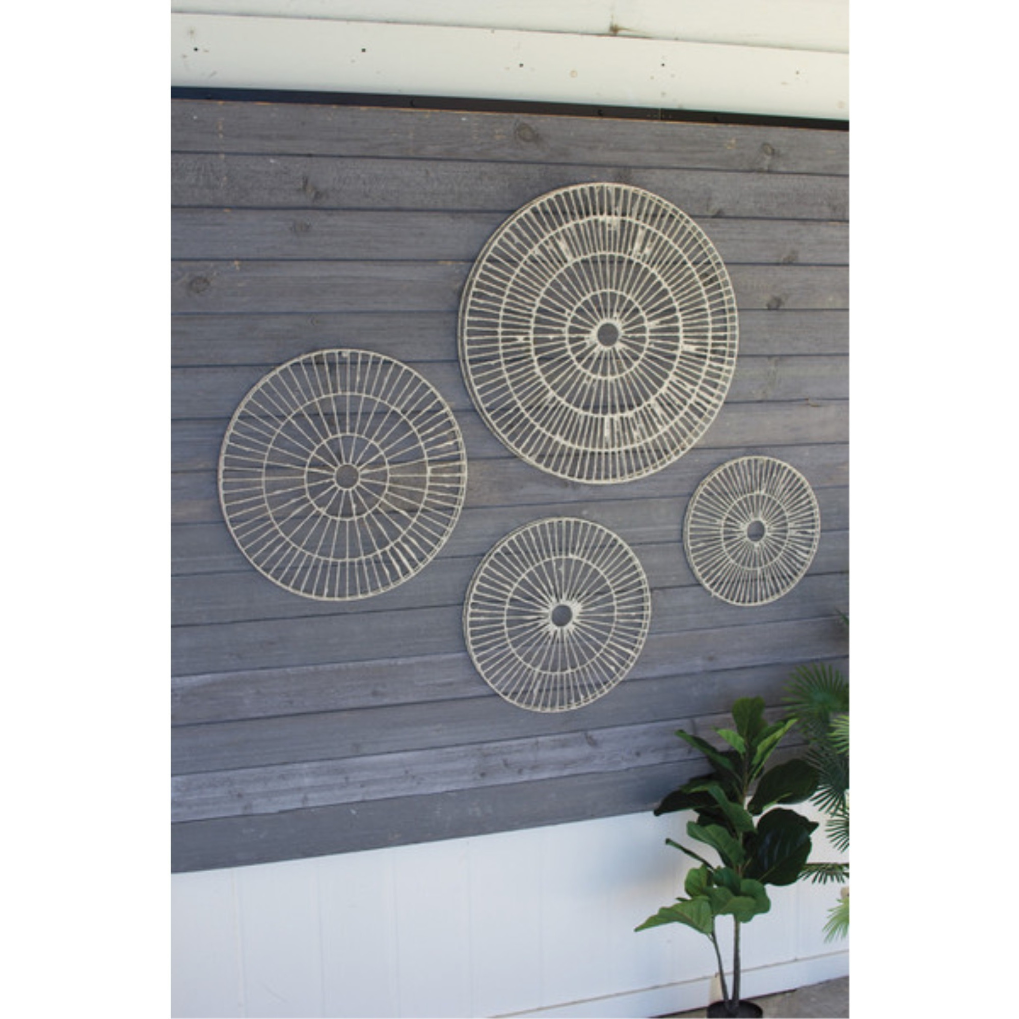 SET OF FOUR HAND MADE PAPER DISCS WALL ART