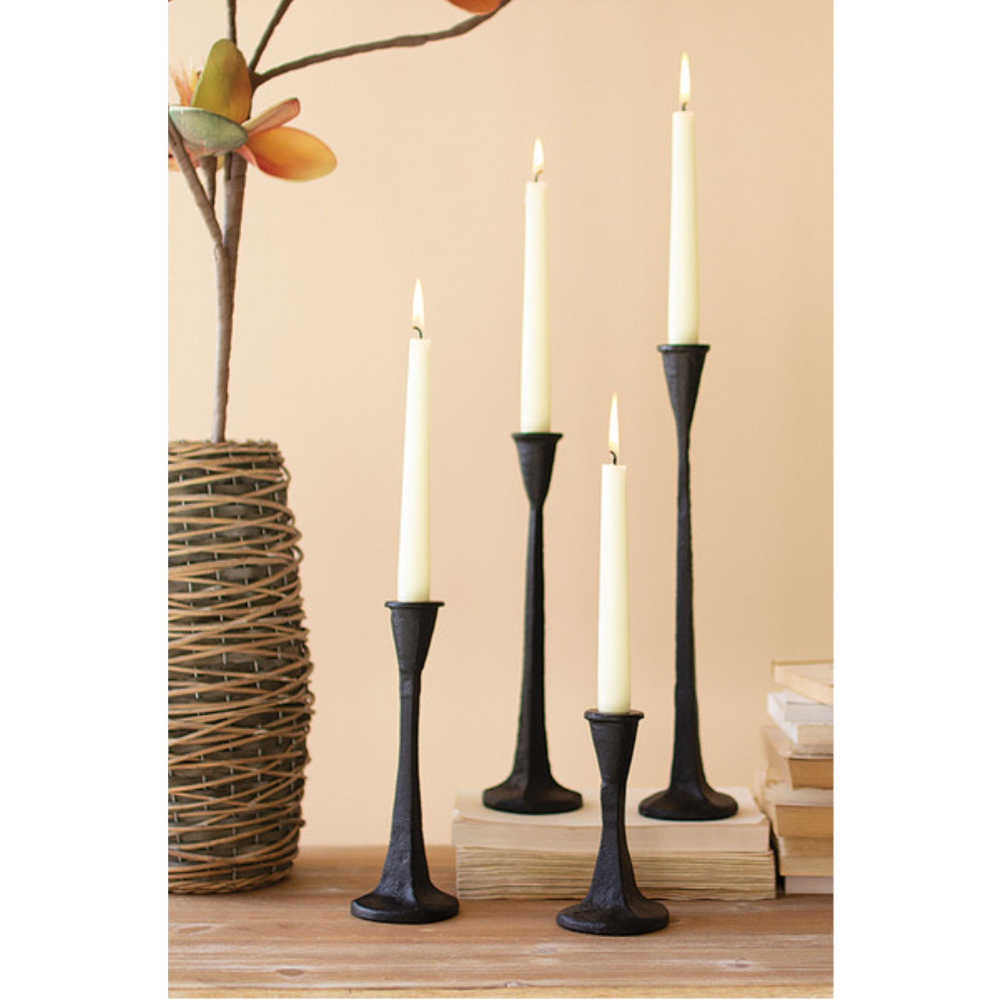 SET OF FOUR CAST IRON TAPER CANDLE HOLDERS - BLACK