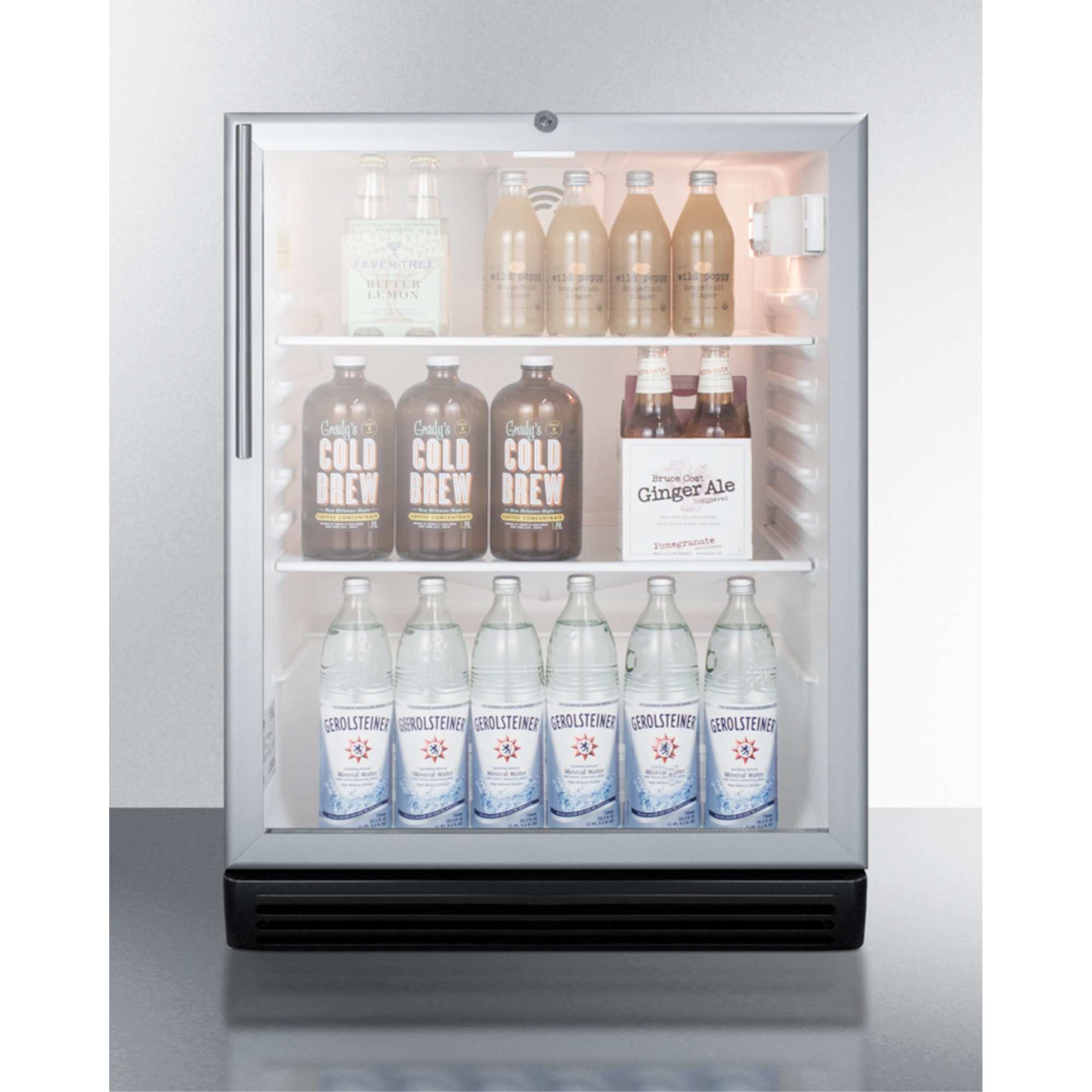 Commercially listed ADA compliant built-in undercounter beverage center with black cabinet, glass door, stainless steel handle, and lock